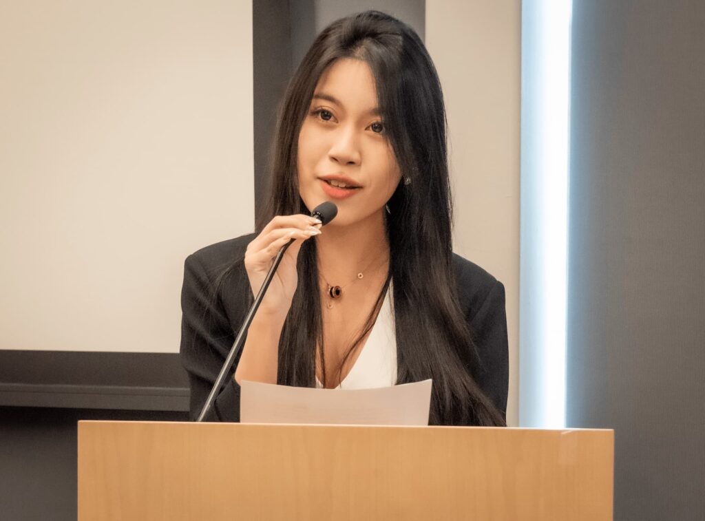 A speaker delivers closing remarks to conclude the session.