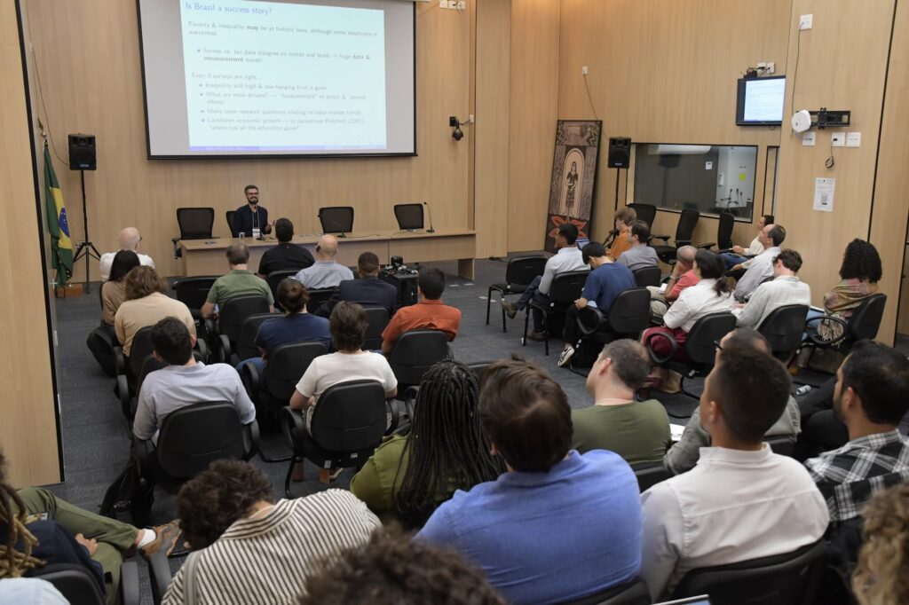 A wide view of the audience and speaker during the session.