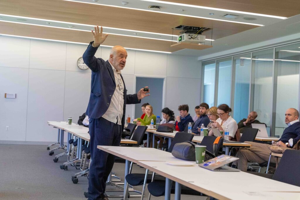 A speaker presents their ideas to the audience during the session.