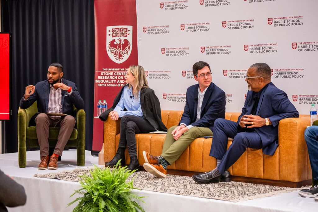 A candid moment of scholarly discussion.