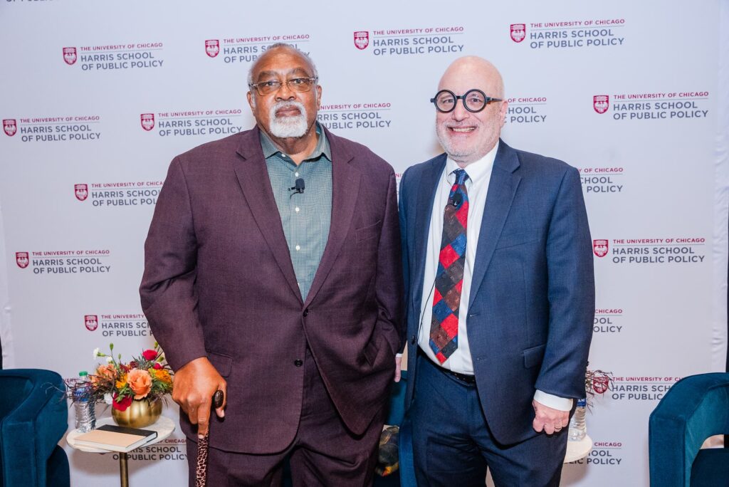 Two panelists pose for a photo following the discussion.