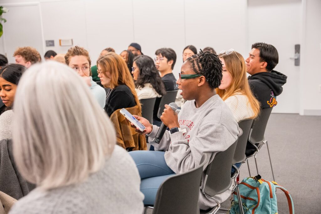 A participant raises a question during the Q&A session.