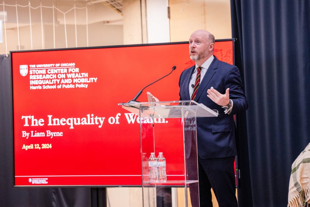 A panelist speaks from the podium during the session.