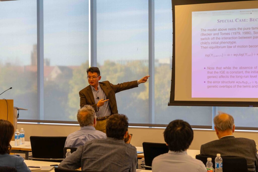 A speaker presents their ideas to the audience during the session.