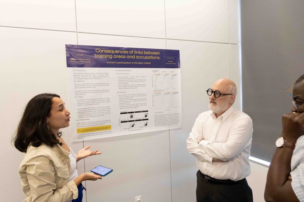 Students present their research during the poster session.