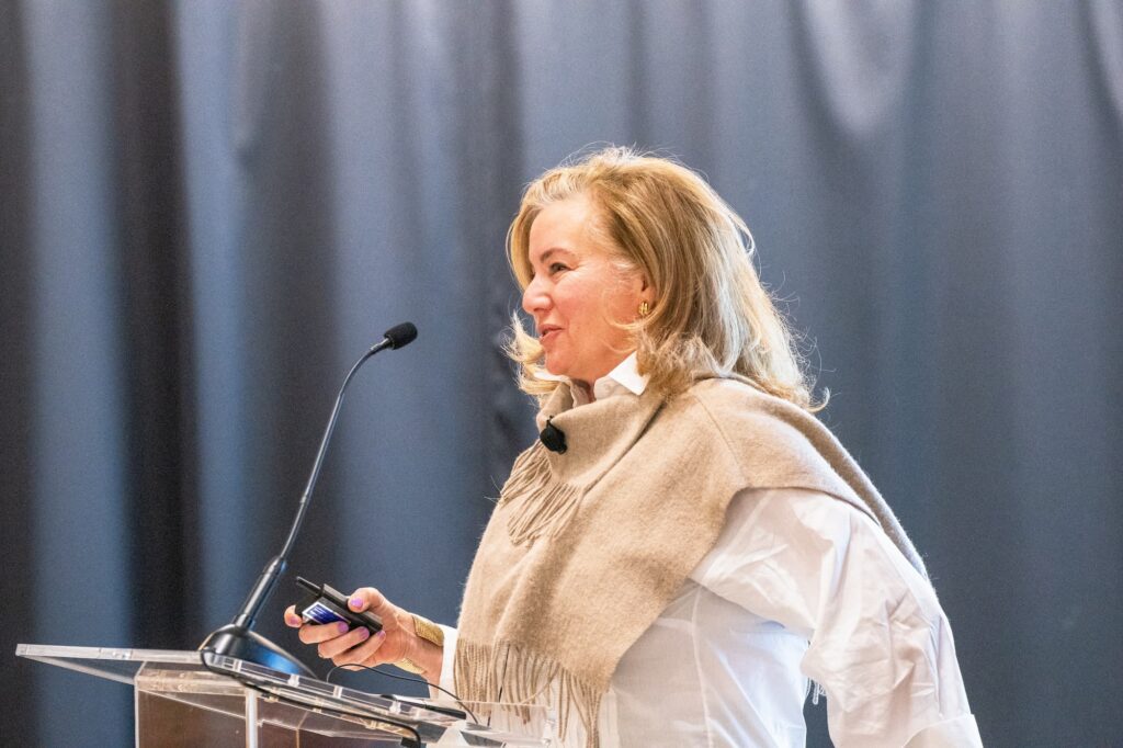 A panelist speaks from the podium during the session.