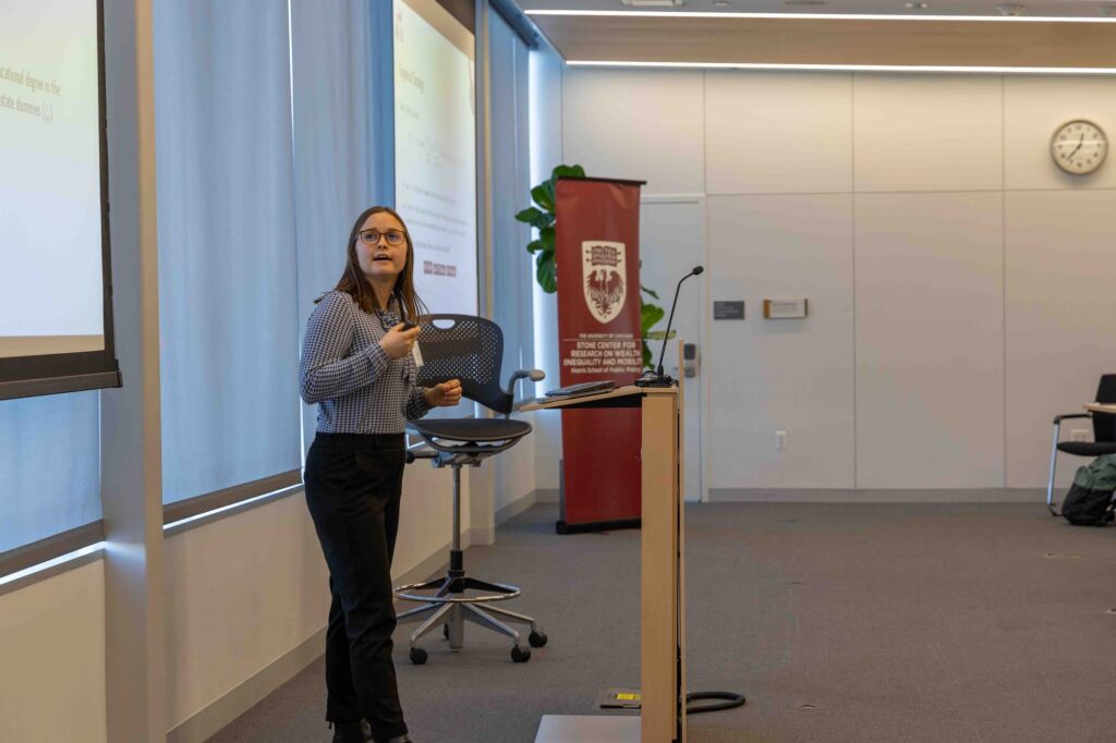 A speaker presents their ideas to the audience during the session.
