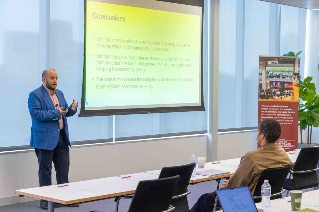 A speaker presents their ideas to the audience during the session.