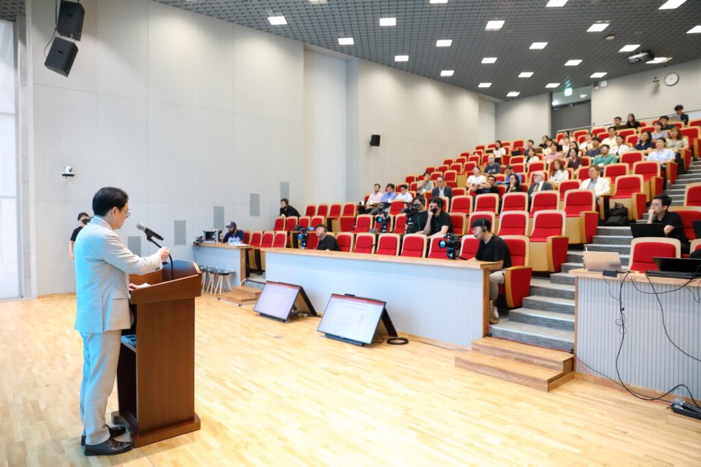 A wide view of the audience and speaker during the session.