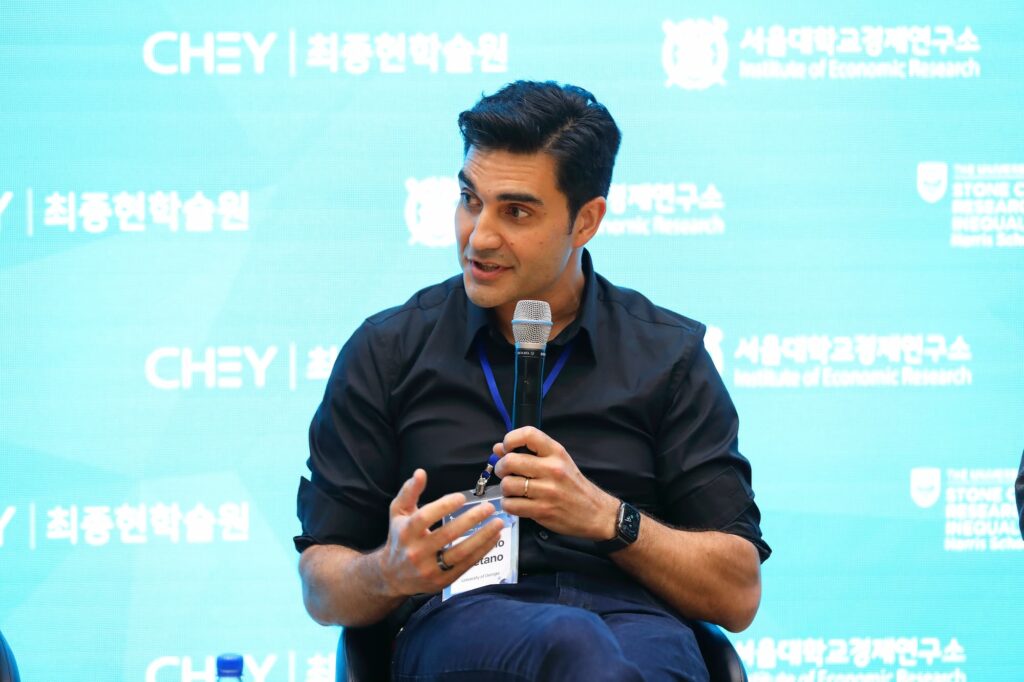 A speaker shares their perspective with participants.