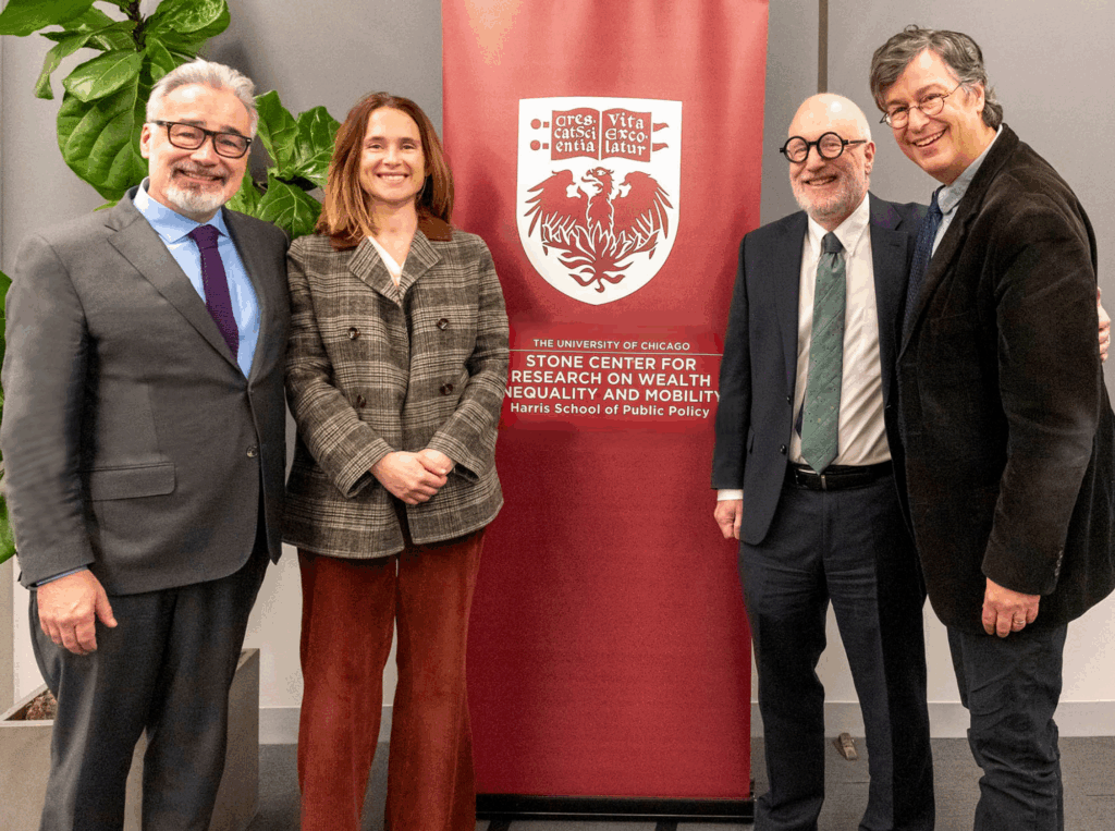 Panelists gather for a group photo following the discussion.