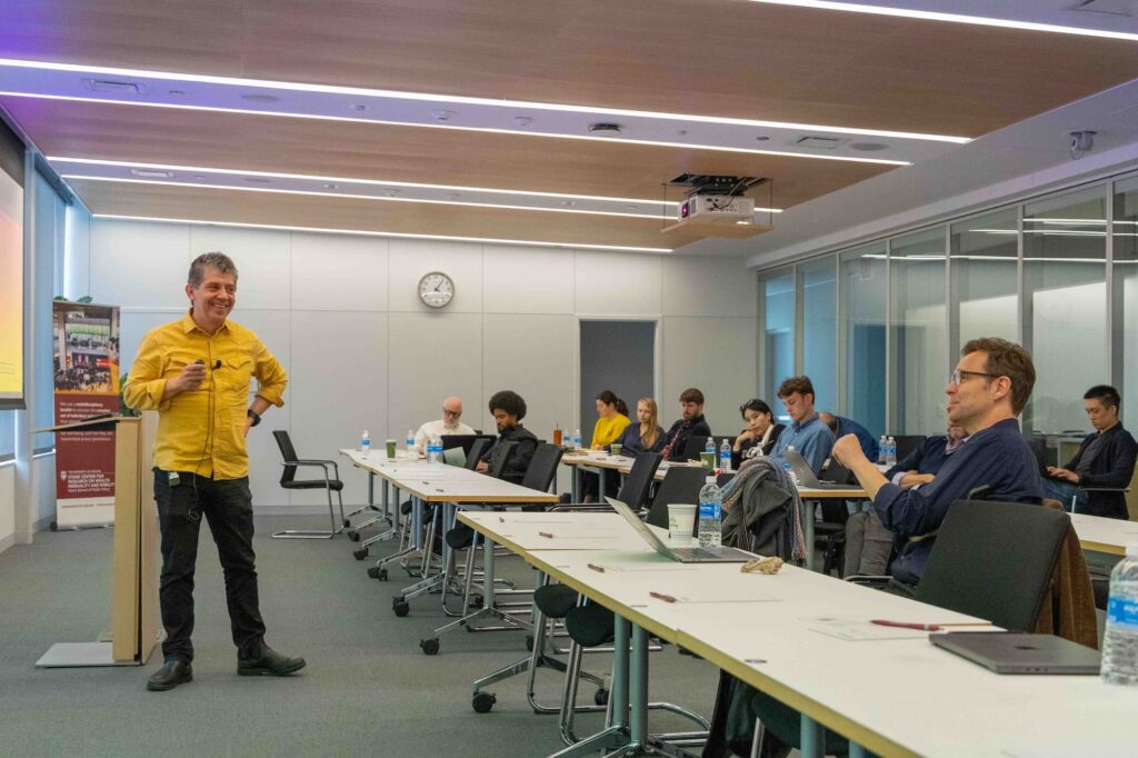 A speaker presents their ideas to the audience during the session.