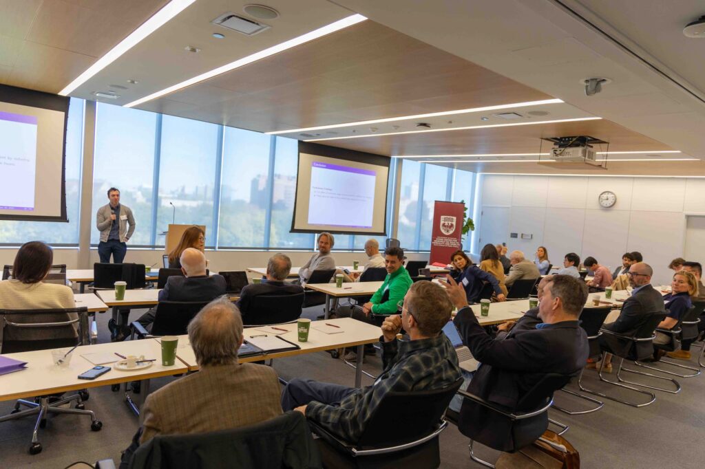 A speaker presents their ideas to the audience during the session.