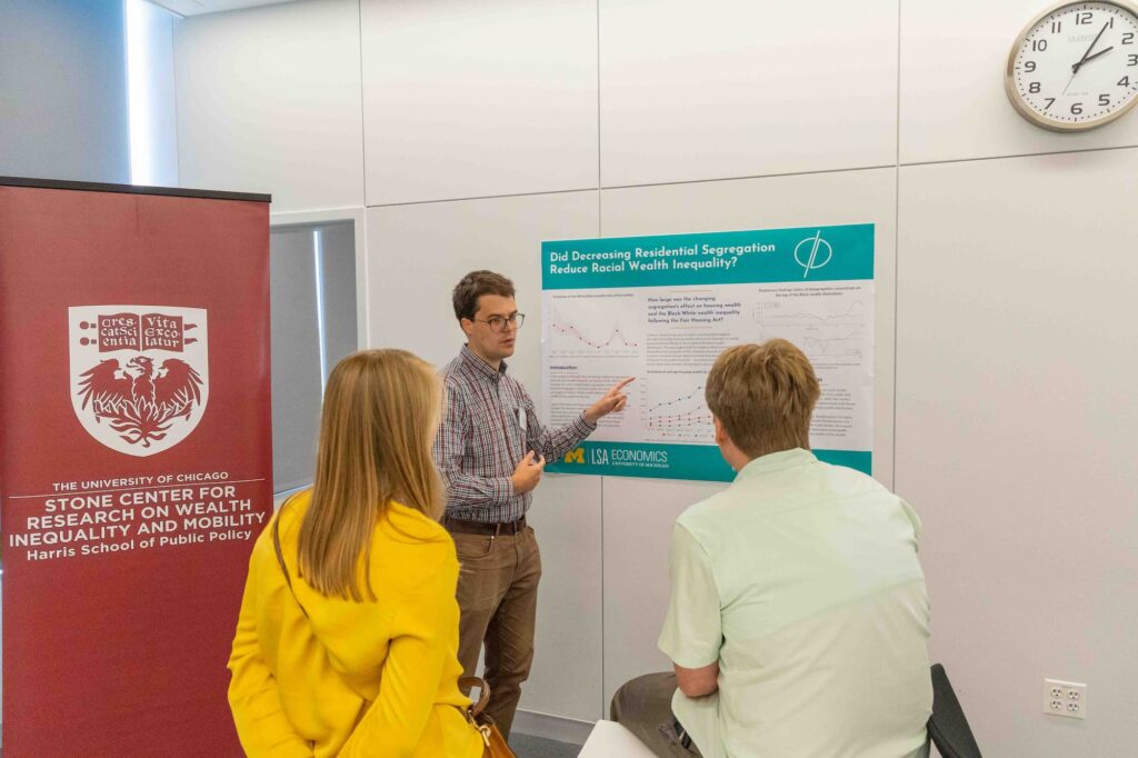 Students present their research during the poster session.